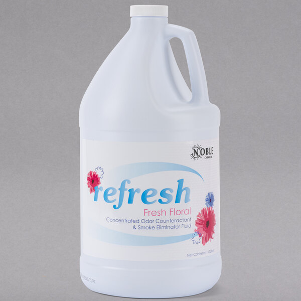 A white jug of Noble Chemical Refresh Concentrated Deodorizing Fluid with a label.
