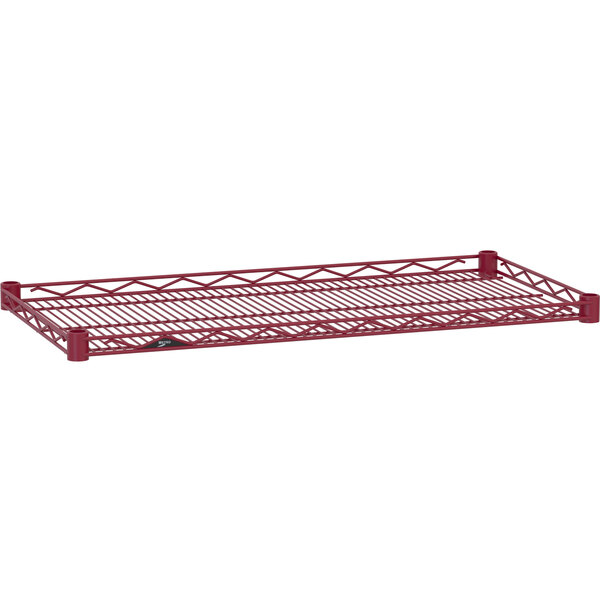 A red Metro Super Erecta wire shelf with a wire drop mat.