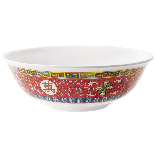 A close-up of a white GET Melamine bowl with an oriental design.