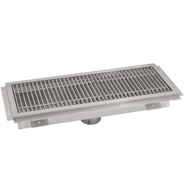An Advance Tabco stainless steel floor trough drain with a steel grate.