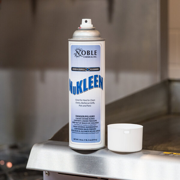 A white spray bottle of Noble Chemical Nukleen Ready-to-Use Oven / Grill Cleaner on a counter.
