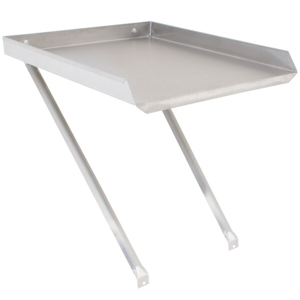 An Advance Tabco detachable stainless steel drainboard on a metal table.