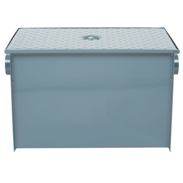 A blue metal Watts WD-25 grease trap with a lid.