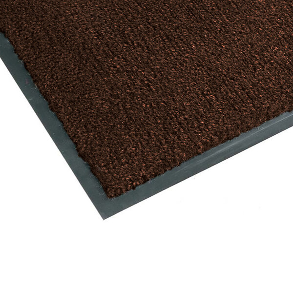A dark brown carpet entrance floor mat with a black border.