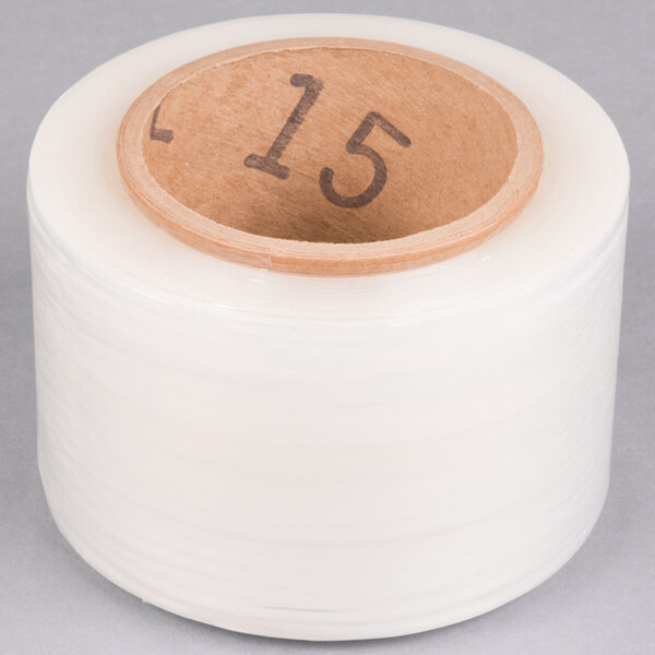 A roll of clear plastic stretch film with a number on it.