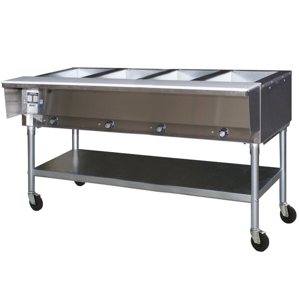 An Eagle Group portable stainless steel hot food table with four open wells on a counter.