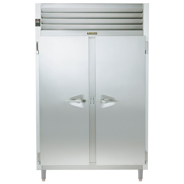 A Traulsen stainless steel reach-in refrigerator with two solid doors.