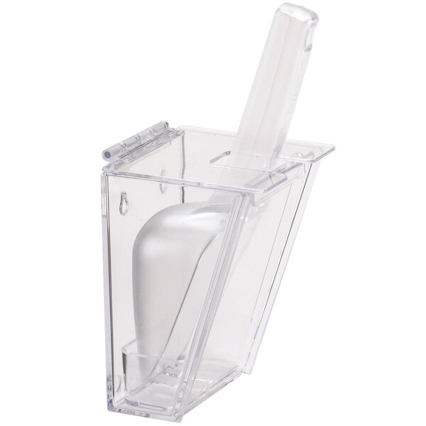 A Cal-Mil clear plastic wall mount scoop holder with a scoop inside.