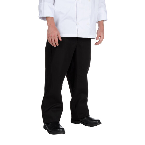 A man wearing Chef Revival black chef trousers with a white chef coat.