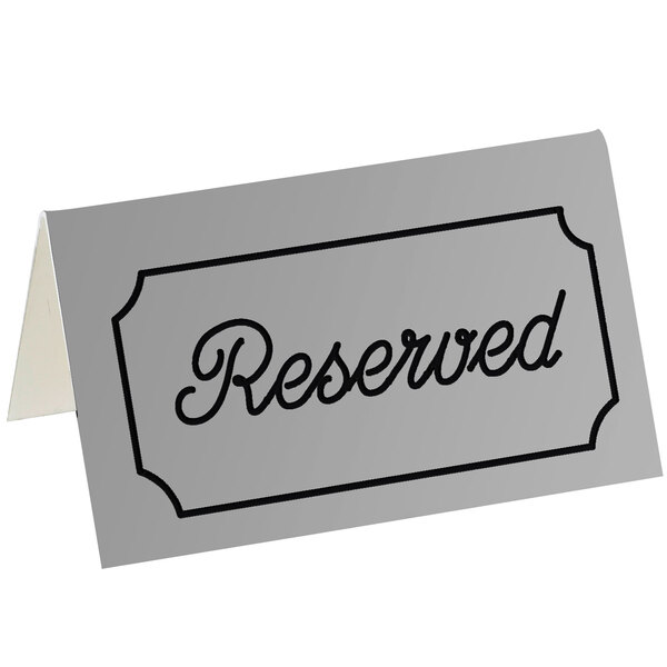 A gray and black Cal-Mil double-sided "Reserved" tent sign.