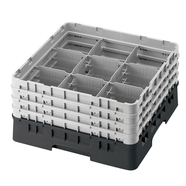 A black plastic Cambro glass rack with nine compartments and six extenders stacked on top.