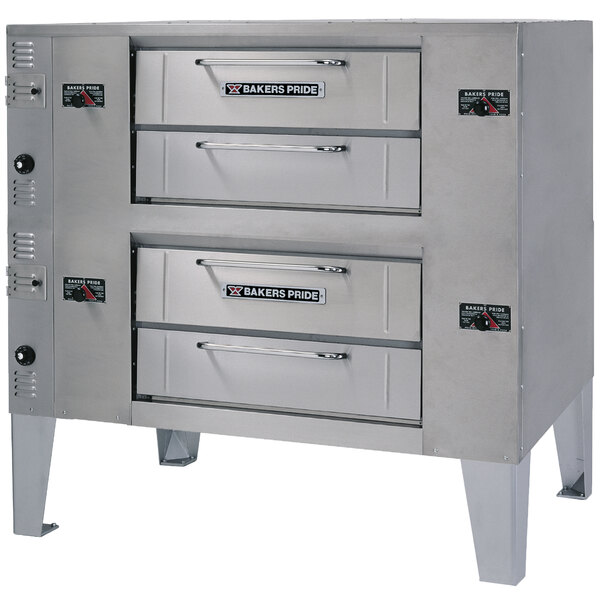 A Bakers Pride double deck pizza oven with two drawers on each side.