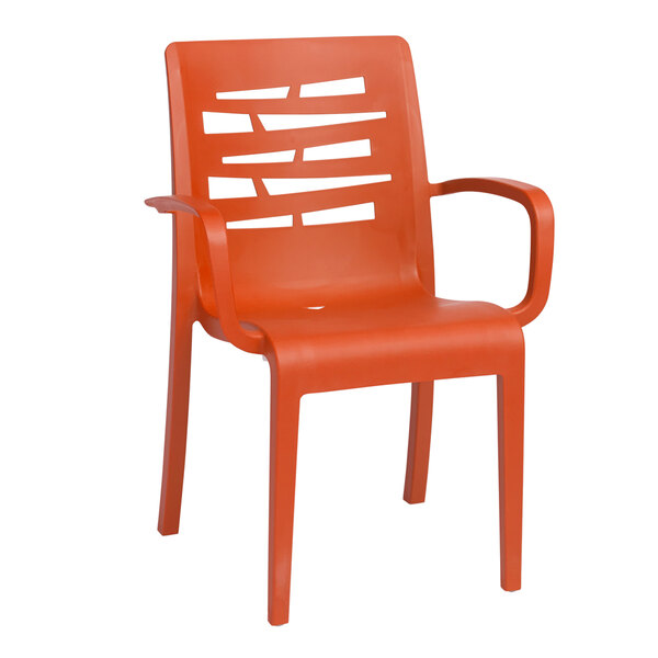 A pack of 4 orange plastic Grosfillex Essenza stacking armchairs.