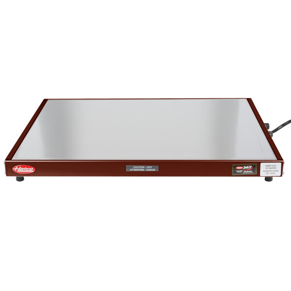 A white Hatco heated shelf warmer with copper heating elements.