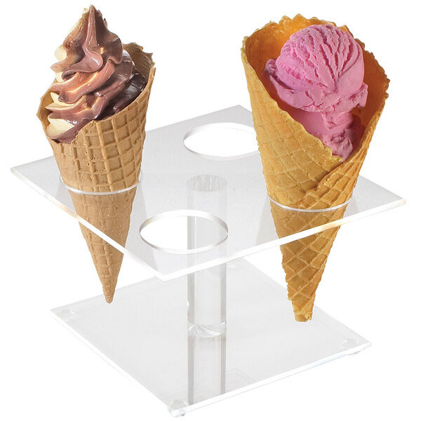 A clear stand with two ice cream cones displayed.
