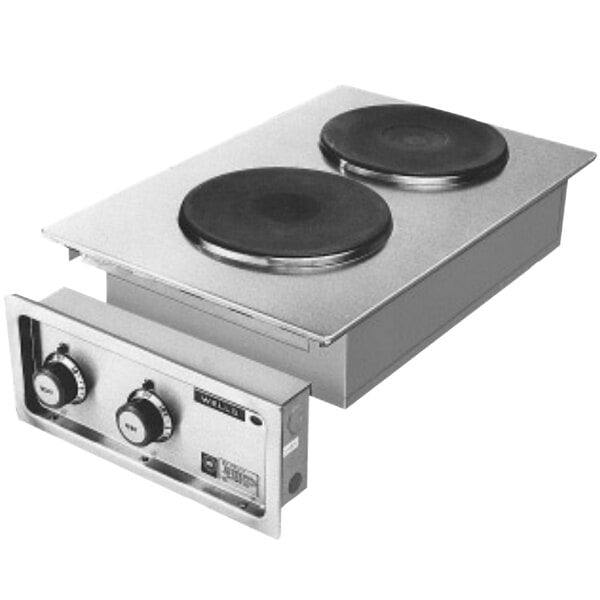 A Wells countertop double electric burner with a black surface.