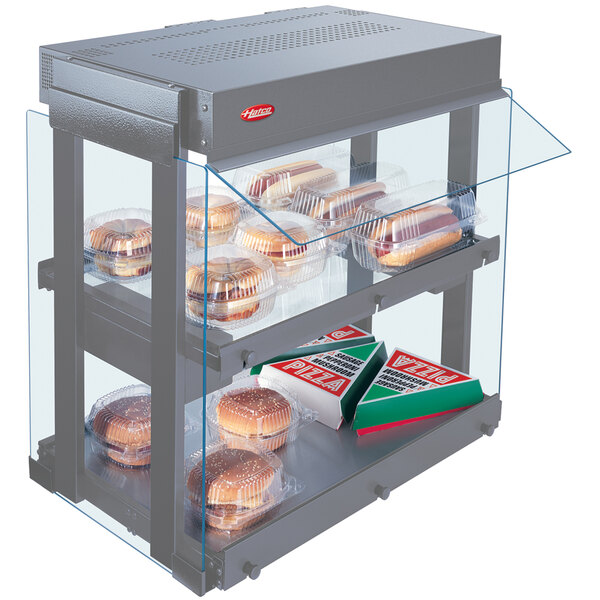 A Hatco countertop food display case with heated food shelves.