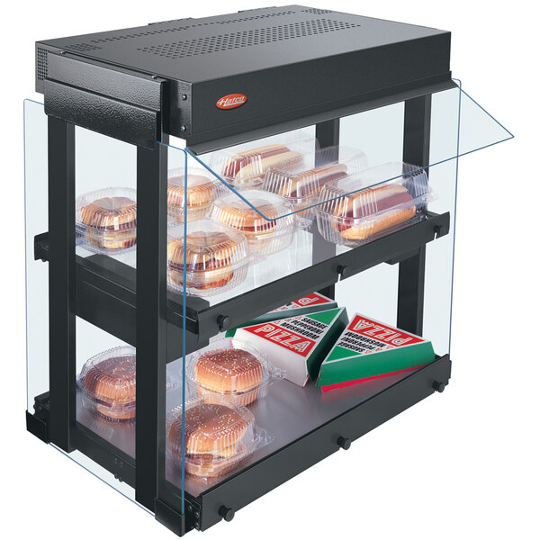 A gray Hatco countertop food display warmer with shelves of hot food.