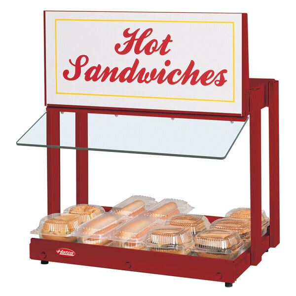 A Hatco countertop hot food display warmer with a sign for hot sandwiches.