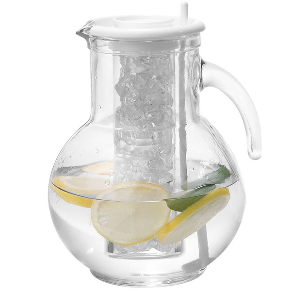 A Cal-Mil glass pitcher with water and lemon slices.