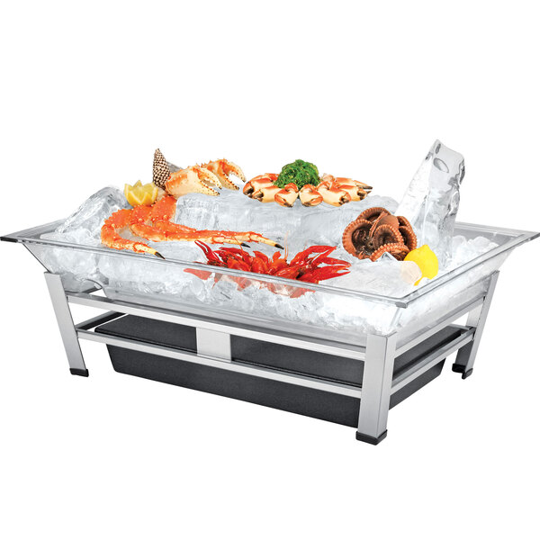 A large rectangular Cal-Mil ice housing system filled with seafood on ice.
