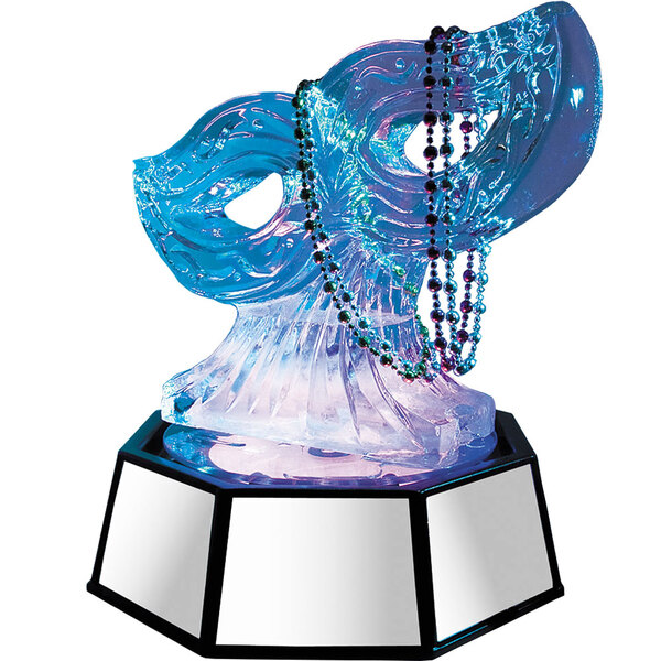 A blue and purple glass sculpture on a Cal-Mil Rotating Ice Carving Mirror Pedestal with LED lighting.