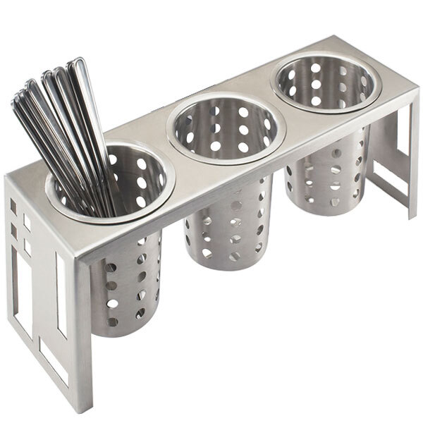 A stainless steel squared container with three metal cylinders holding utensils.