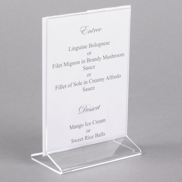 A Cal-Mil standard acrylic displayette with a menu card on a stand.