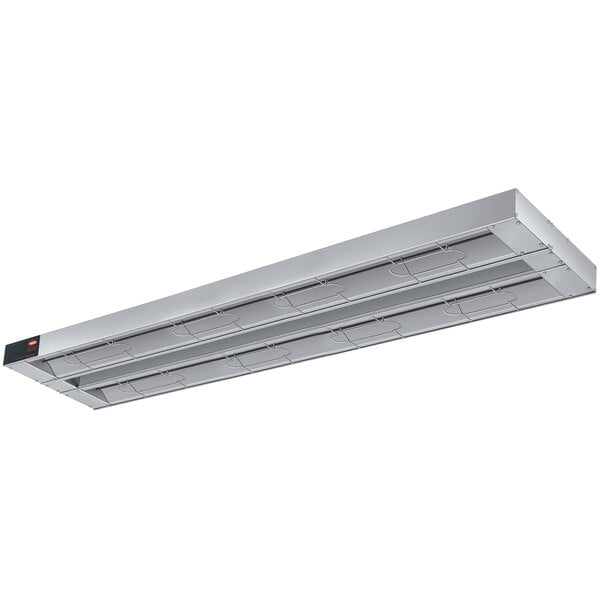 A long rectangular stainless steel Hatco strip warmer with lights on each end.