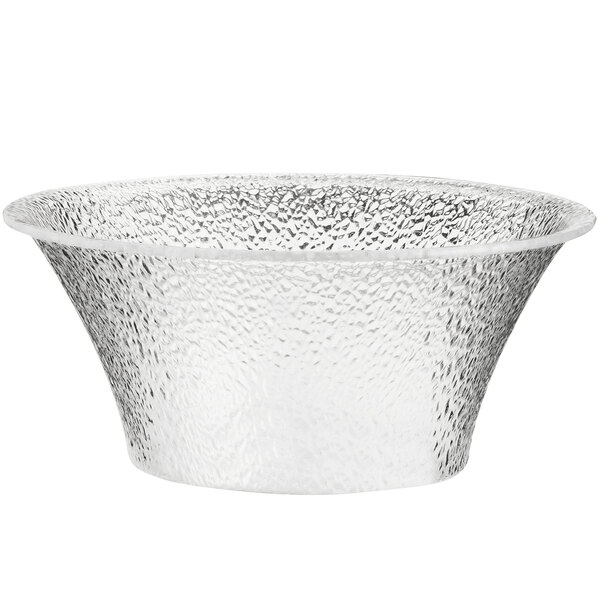 A clear acrylic bowl with a textured surface and a metal rim.