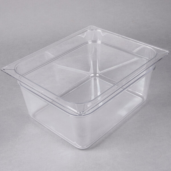 A Cal-Mil clear plastic housing insert pan with a lid.