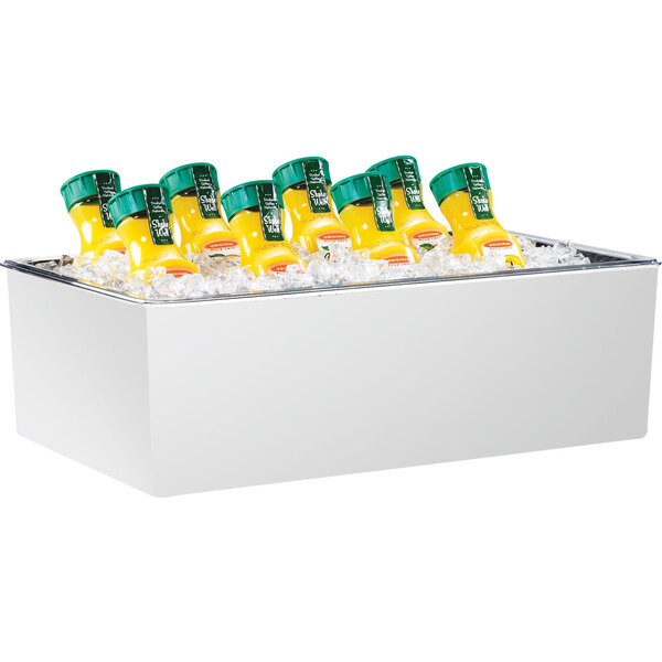 A white Cal-Mil ice housing container holding yellow bottles with green caps in ice.