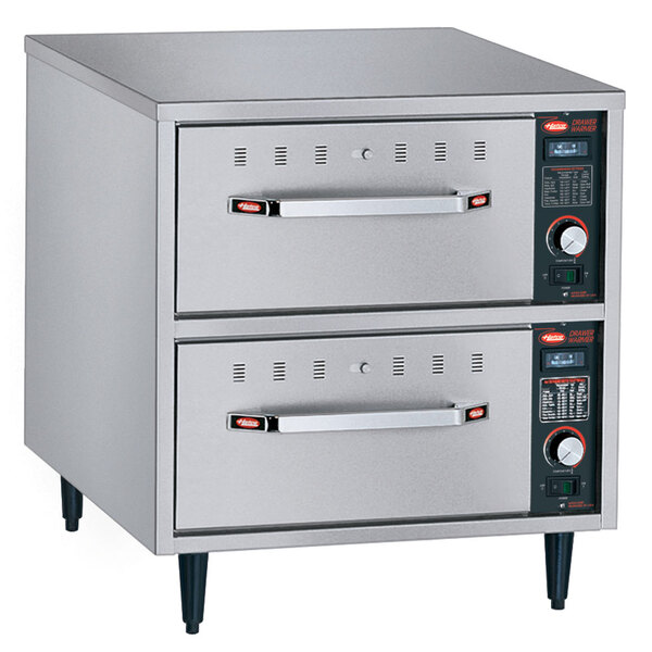A Hatco freestanding narrow drawer warmer with two stainless steel drawers.