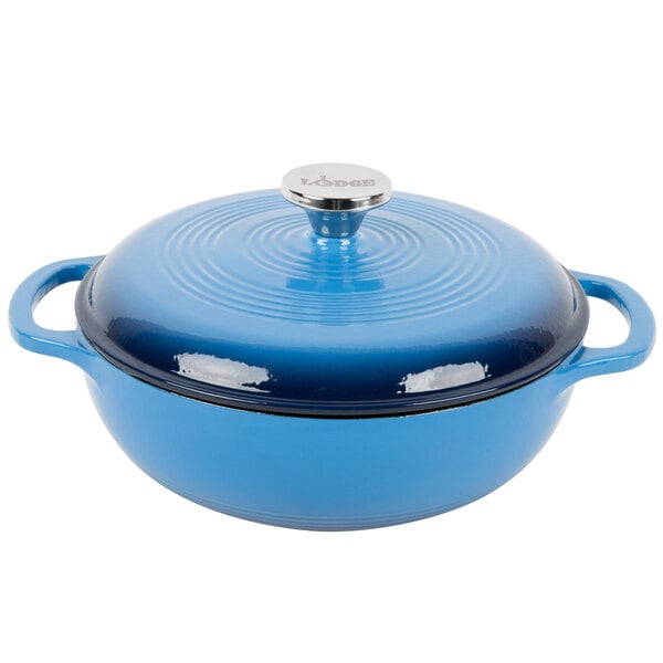 A Caribbean blue Lodge enameled cast iron Dutch oven with lid.