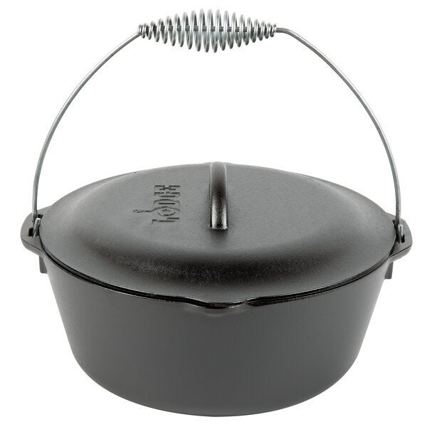 A Lodge black cast iron dutch oven with a metal handle and lid.