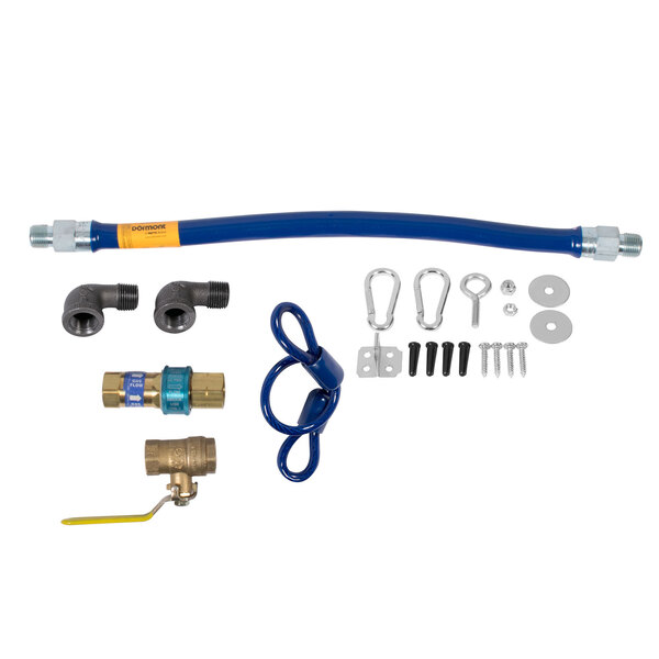 A Dormont blue and yellow gas connector kit with fittings and a restraining cable.