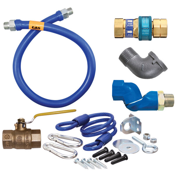 A blue Dormont gas connector hose with fittings and various parts.