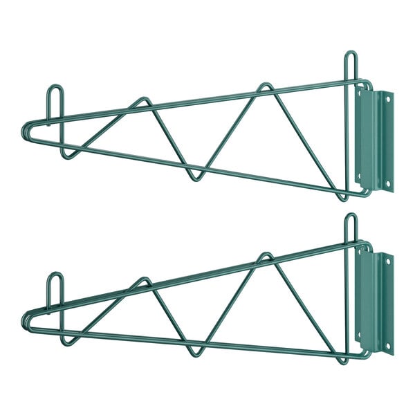 A pair of green metal brackets with hooks on them.