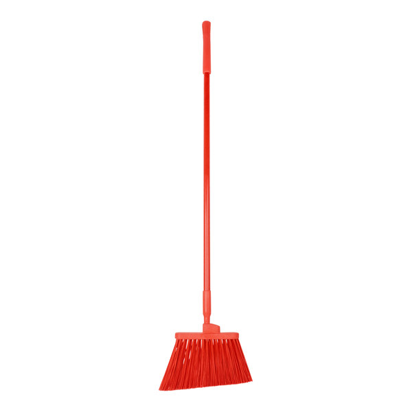 A red broom with long handle and long bristles.