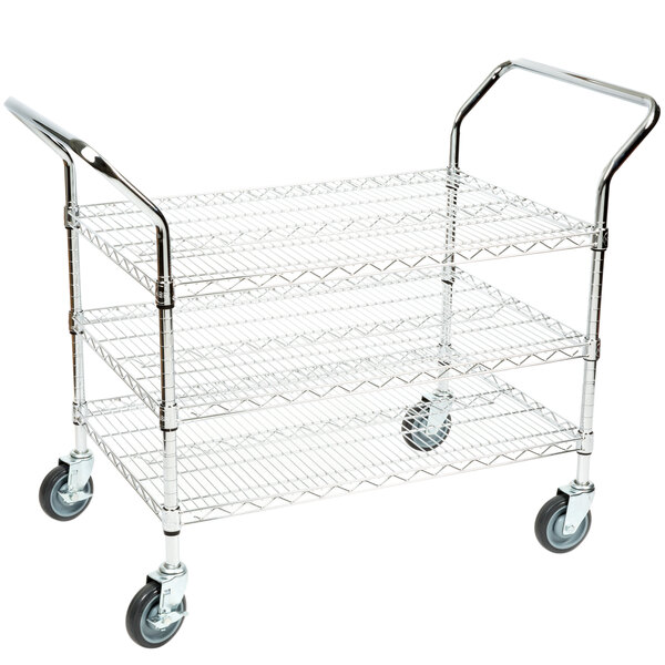 A Regency chrome metal utility cart with three shelves and wheels.