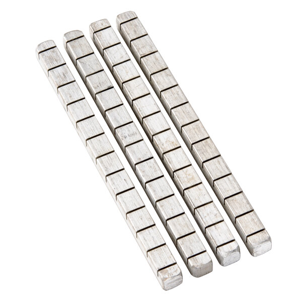 A group of Nemco 1/4" silver metal bars.