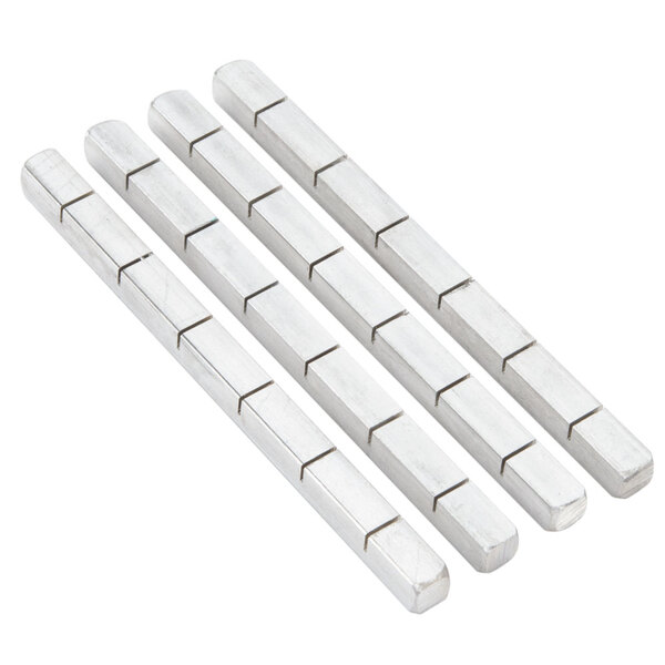 Four silver rectangular metal bars.