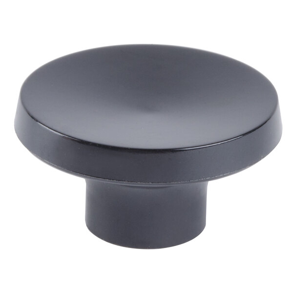 A black round knob with a white background.