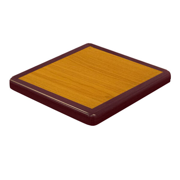 An American Tables & Seating square wooden table top with a cherry and mahogany finish.