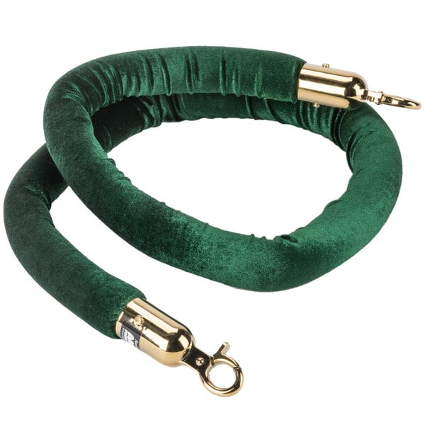 A green velvet rope with brass ends.