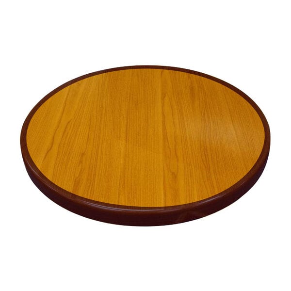 An American Tables & Seating round wooden table top with a brown border.