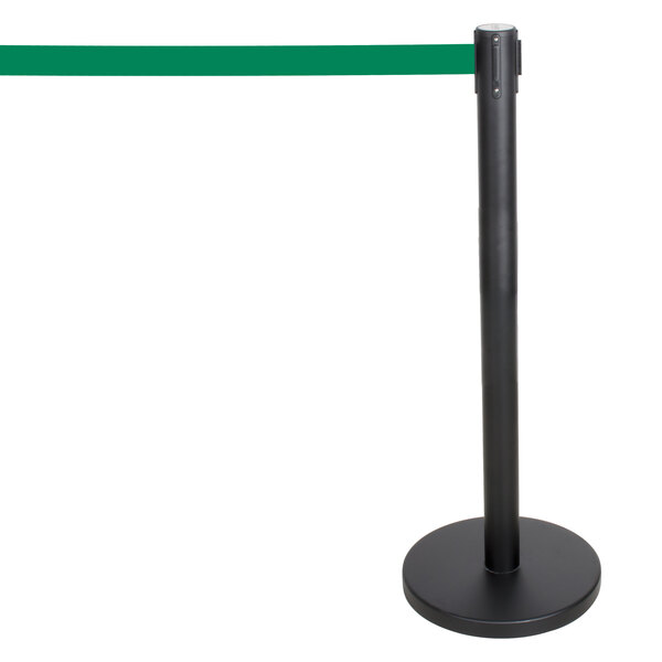 A black pole with a green retractable belt.