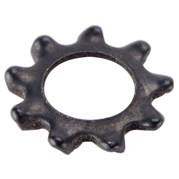 A black metal gear wheel with a white circle.