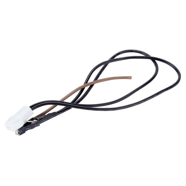 A black and brown wire with a white connector.