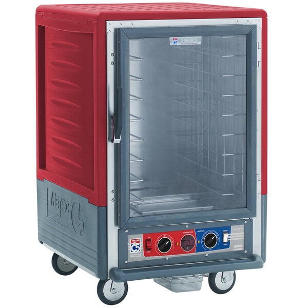 A red commercial Metro heated holding and proofing cabinet with clear door.